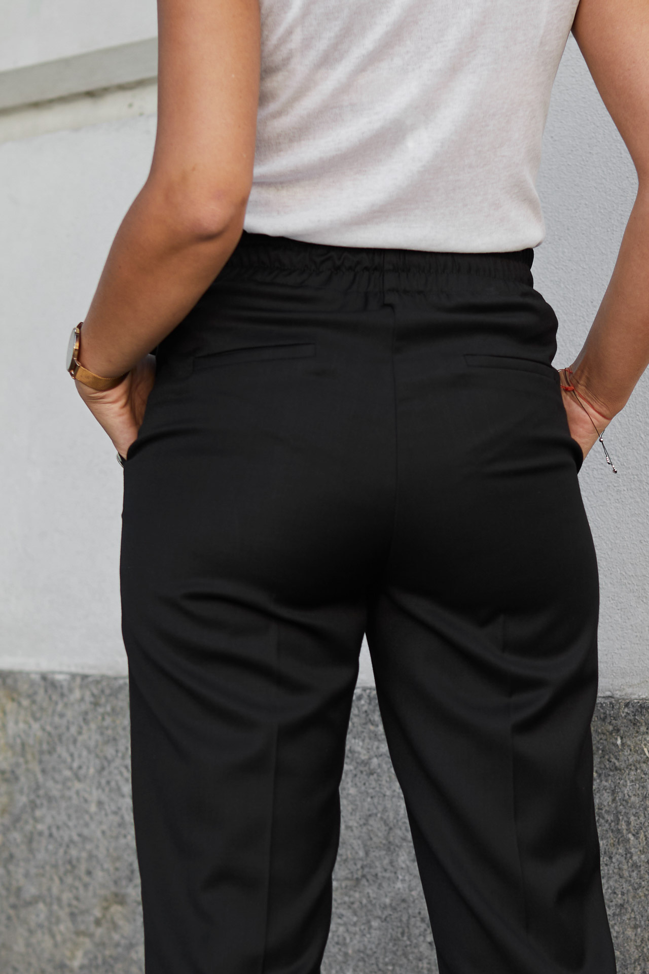 Elegant black pants with decorative buttons