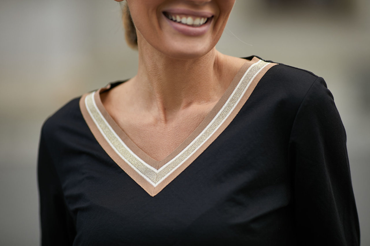 Blouse with decorative tape